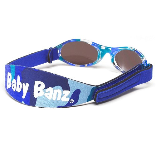 Baby Banz shield sunglasses with a blue camouflage patterned strap and blue/teal patterned frames, featuring brown-tinted lenses.