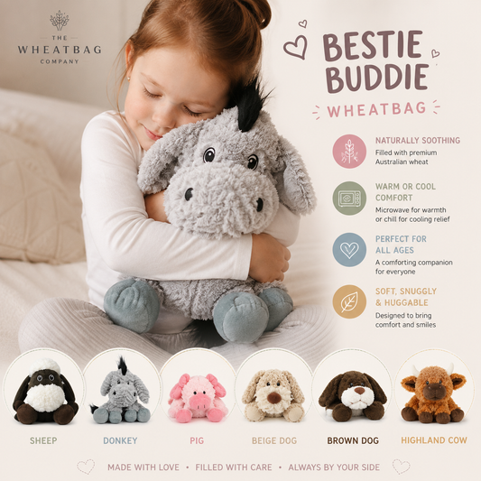 A child hugging a plush stuffed animal in a soft indoor setting, with promotional text reading 'BESTIE BUDDIE' and 'WHEATBAG' and a list of product benefits. The bottom shows six plush toy options: sheep, donkey, pig, beige dog, brown dog, and highland cow.
