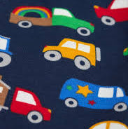 A close-up of a navy blue fabric with a colorful pattern of cartoon cars, including yellow, red, green, and blue vehicles.