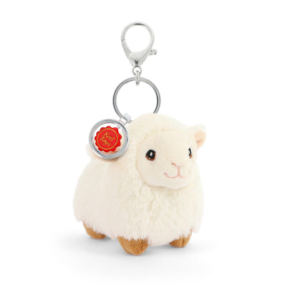 Plush sheep keychain with a red tag on a white background