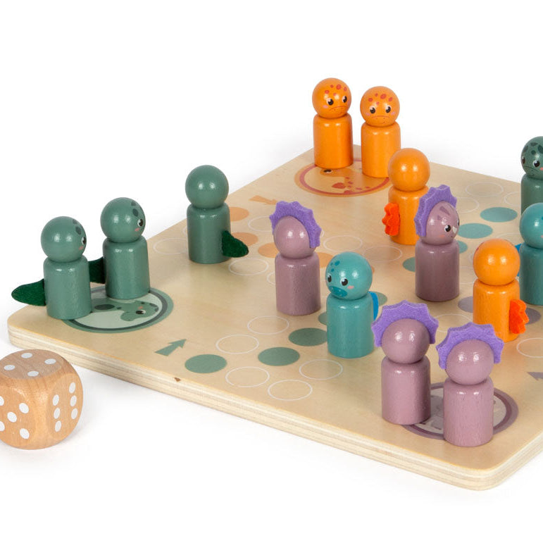 A wooden board game with colorful peg-like pieces arranged on a light wood board, shown on a white background with an FSC responsible forestry logo and text at the bottom left.