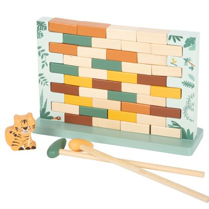 Wooden block tower building set with colorful blocks and two wooden mallets on a white background